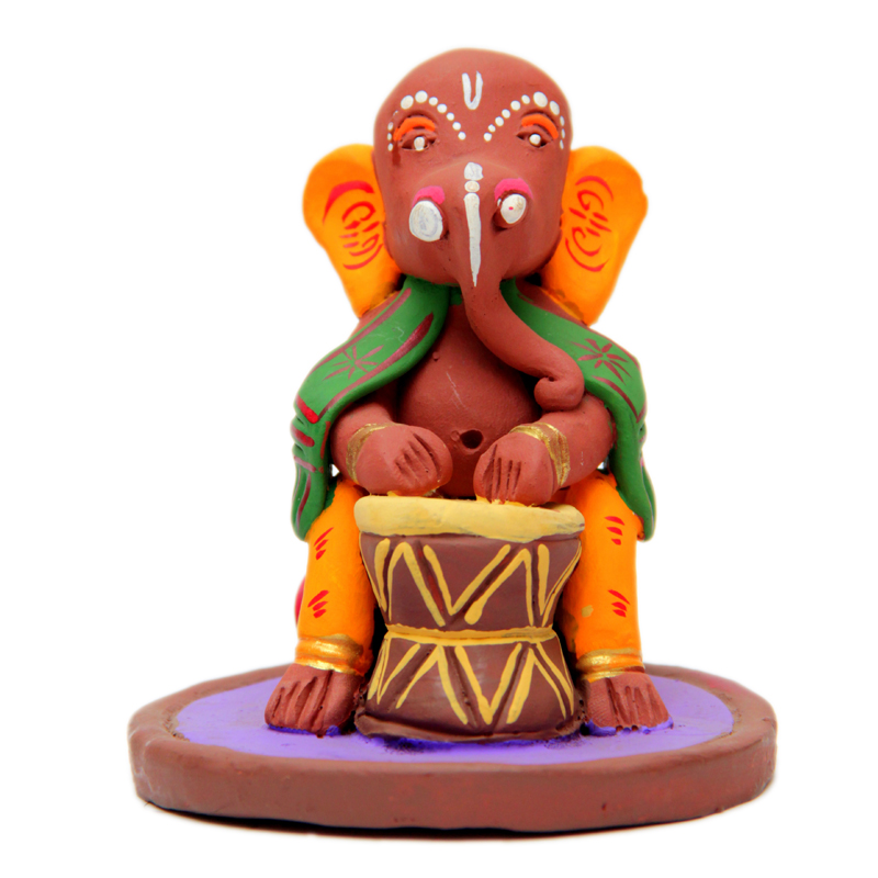 Clay Ganesh figure playing a drum from the HANDCRAFT Aura range