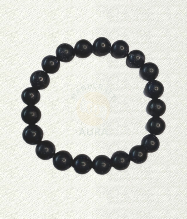 Blue Goldstone bracelet with dark blue round beads and fine reflective speckles