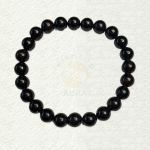 Garnet bracelet with glossy, almost-black round beads and subtle dark-red tones
