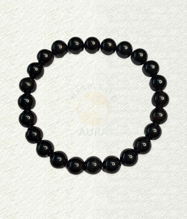 Garnet Bracelet Garnet bracelet with glossy, almost-black round beads and subtle dark-red tones