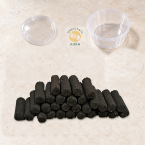 Pavitra Dhuni Dhoop Sticks, 30 pieces in a natural pile with an empty small container and separate lid.
