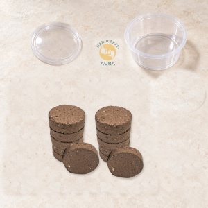 Representative photo of 12 regular-size dhoop tikkis with an empty small container and separate lid.