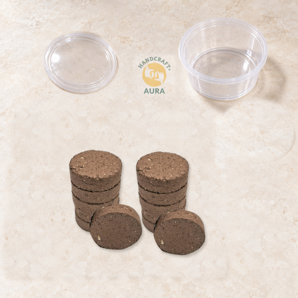Representative photo of 12 regular-size dhoop tikkis with an empty small container and separate lid.